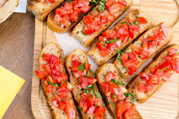 Bruschetta with sweet tomatoes and basil