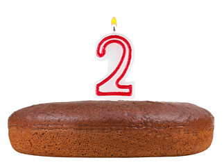 birthday cake with candles number 2 isolated on white background