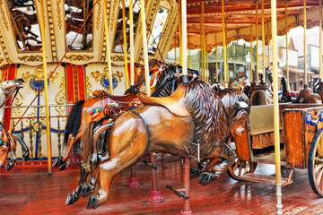 Fototapeta na wymiar Carousel. Horses on a carnival.