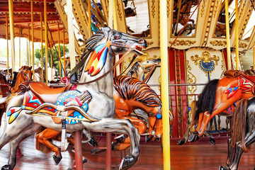 Carousel. Horses on a carnival.