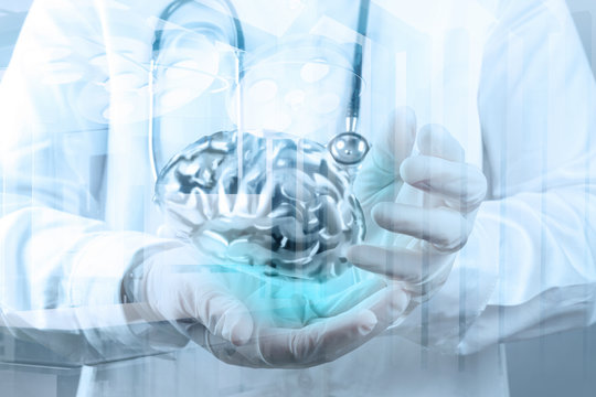 doctor neurologist hand show metal brain with computer interface