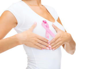 woman with pink cancer awareness ribbon