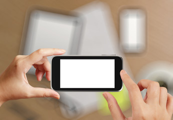 woman hand holding the phone tablet touch computer gadget as con