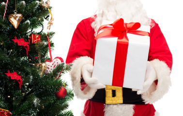 man in costume of santa claus with gift box