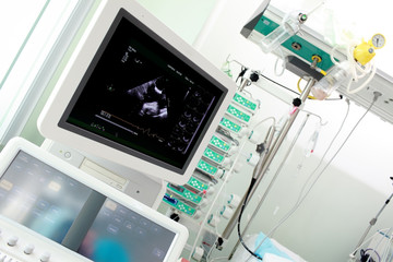 Examination of the heart using ultrasound machine in the ICU