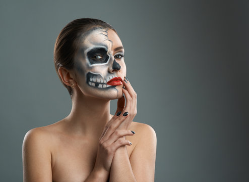 beautiful woman with makeup skeleton