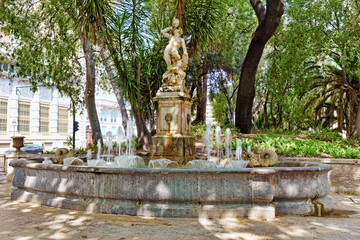 Fototapeta na wymiar Fountain in park - places of Valencia, city in Spain.
