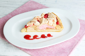 Piece of tasty pie with apples and berry mousse,