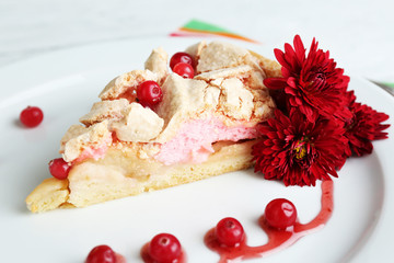 Piece of tasty pie with apples and berry mousse,