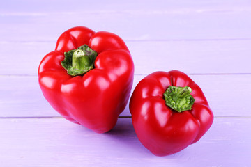 Red pepper on wooden background
