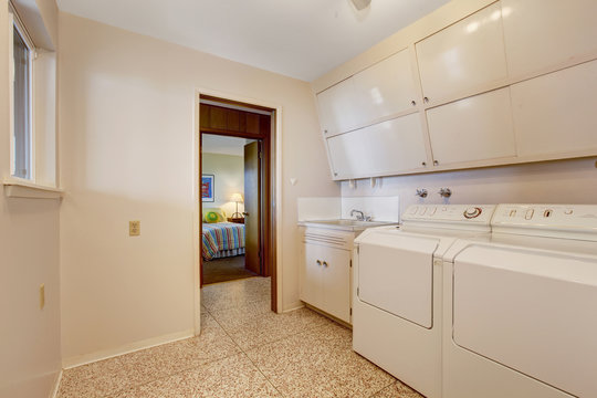 Laundry with built in cabinets