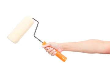 holding a paint roller isolated on a white background