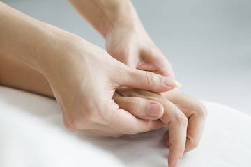 State in which massage the back of the hand