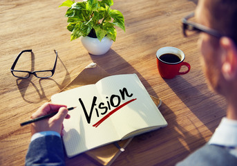 Man with a Note and a Single Word Vision