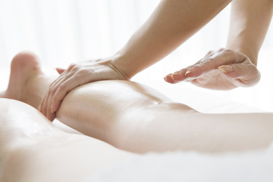 Oil massage of legs