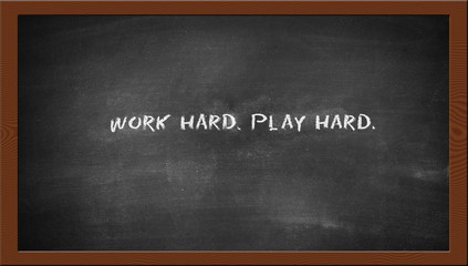 work hard play hard text on the chalkboard