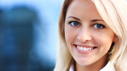Close up portrait of young woman in business suit