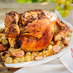 Whole Roast Chicken with Grapes, Garlic and Almonds