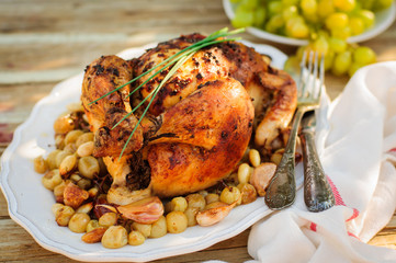 Whole Roast Chicken with Grapes, Garlic and Almonds