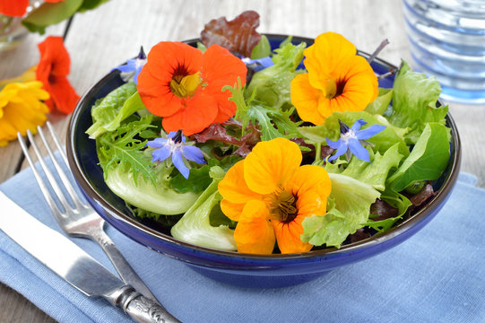 Salad with edible flowers nasturtium, borage.