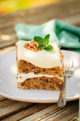 A Piece of Zucchini and Walnut Cake with Cream Cheese Frosting