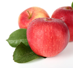 Ripe red apples isolated on white