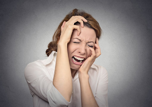 Headshot portrait desperate woman crying very upset