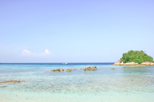 Fototapeta Rocks , sea and blue sky - Lipe island Thailand