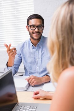 Businessman interviewing woman