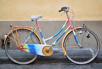Fototapeta na wymiar bike painted in all the colors of the rainbow