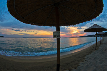 Beach near small greek village Toroni at sunset in Sithonia