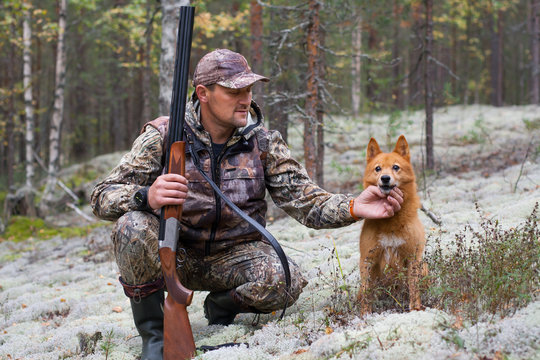 the hunter with his dog