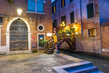 Fototapeta na wymiar Night view of canal in Venice, Italy