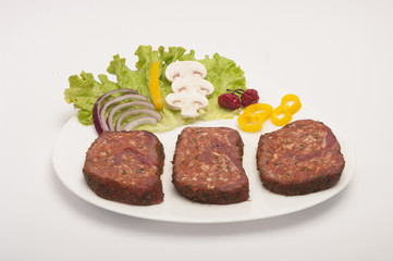 Raw pork Meat Loaf with spices on white
