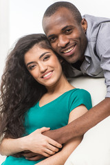 Fototapeta premium Romantic young couple relaxing on sofa.