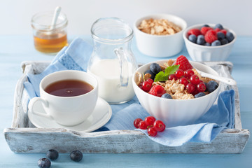 healthy breakfast with cornflakes and berry