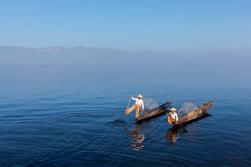 Burmese fisherman at Inle lake, Myanmar © Dmitry Rukhlenko