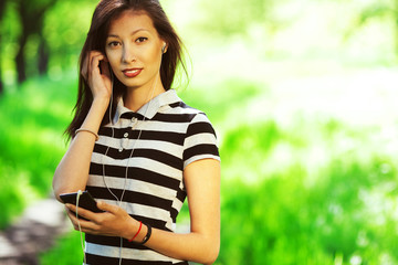 Happy weekend concept. Beautiful girl with smartphone
