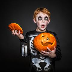Surprised red haired kid in Halloween costume