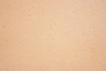 beige background of fine sawdust pressed