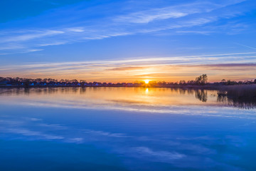 Fototapeta premium sunset in Zinnowitz with reflection on the water