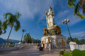 Place of worship in front of statue of Guan Yin / Kuan Im goddes