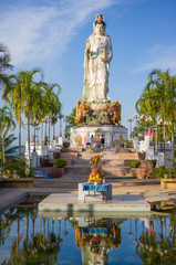 Fototapeta na wymiar Place of worship in front of statue of Guan Yin / Kuan Im goddes
