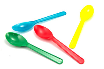plastic ice cream spoons color on a white background.