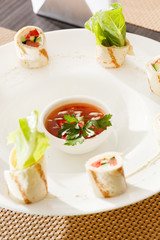 tortilla rolls with sauce
