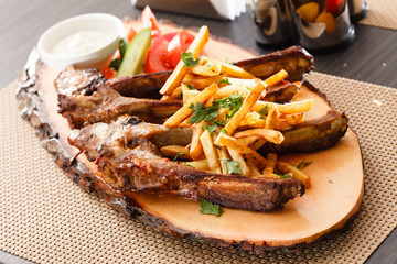 grilled ribs with french fries