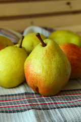 Ripe autumn pears with red barrels.