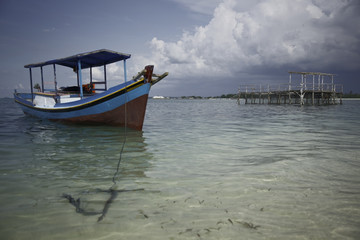 Wooden fisher boat on indonesian sea
