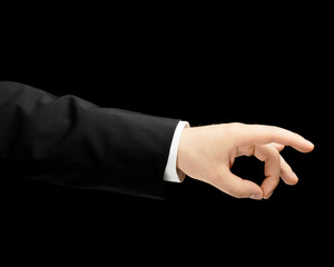 Caucasian male hand in a business suit isolated