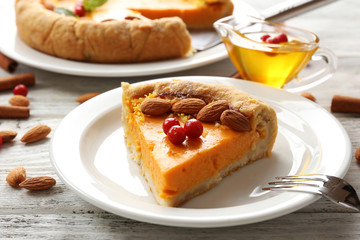 Homemade pumpkin pie on table